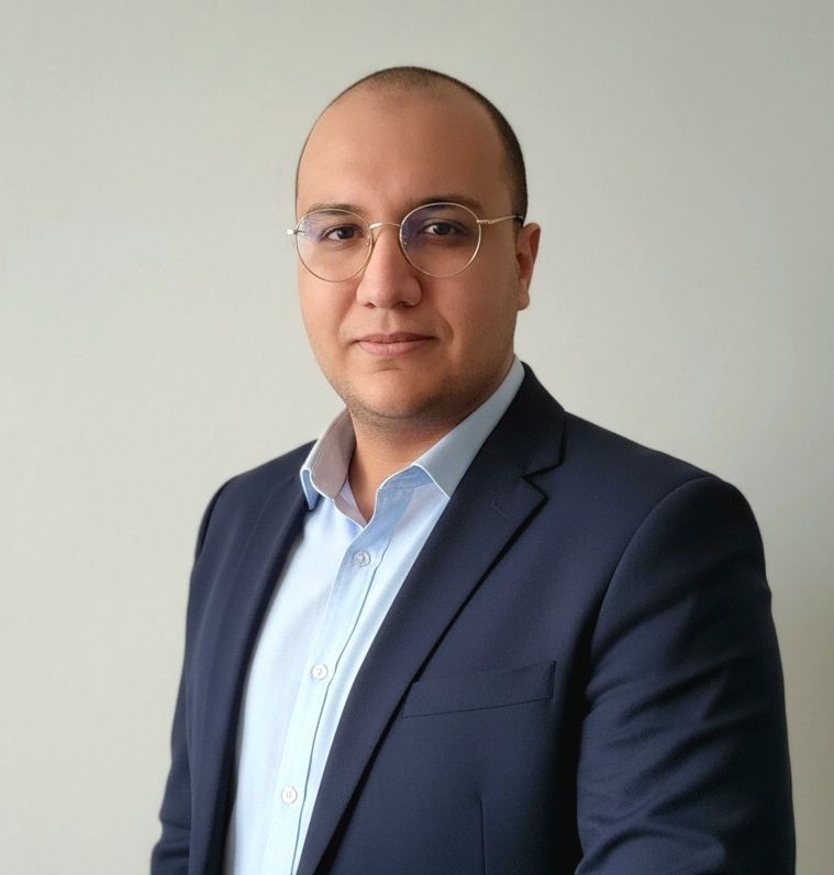 A professional portrait of Walid Gourideche